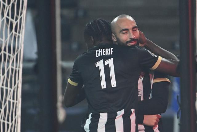 Angers' Algerian midfielder #10 Himad Abdelli (R) celebrates with Angers' French forward #11 Sidiki Cherif (L) after scoring his team's first goal during the French L1 football match between SCO Angers and FC Nantes at the Raymond-Kopa Stadium in Angers, western France, on December 12, 2025. (Photo by JEAN-FRANCOIS MONIER / AFP)