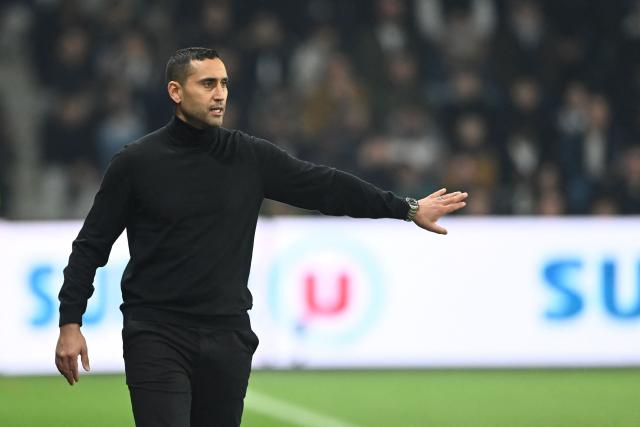 Nantes' French Moroccan head coach Ahmed Kantari gestures during the French L1 football match between SCO Angers and FC Nantes at the Raymond-Kopa Stadium in Angers, western France, on December 12, 2025. (Photo by JEAN-FRANCOIS MONIER / AFP)