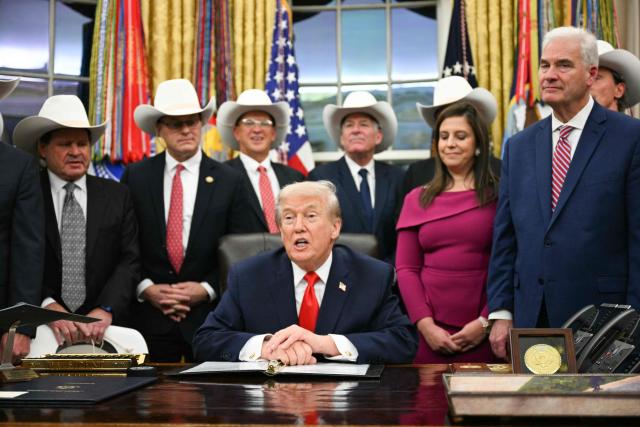 US President Donald Trump speaks during a bill signing ceremony with members of the 1980 US Olympic men's ice hockey team in the Oval Office of the White House in Washington, DC, on December 12, 2025. The legislation will award all of the players with Congressional Gold Medals to recognize the 45th anniversary of the US victory at the 1980 Winter Olympic Games. (Photo by Jim WATSON / AFP)