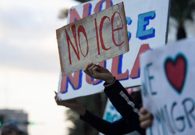 Residents of New Orleans protest outside of the US Customs and Border Protection Office on December 12, 2025 in New Orleans, Louisiana. The Department of Homeland Security launched Operation Catahoula Crunch on December 3 with the stated goal of arresting illegal immigrants with criminal records in New Orleans and surrounding parishes. (Photo by Matthew HATCHER / AFP)