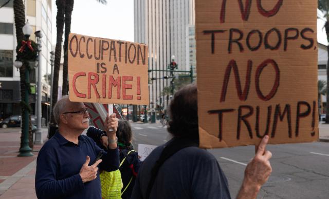 Residents of New Orleans protest outside of the US Customs and Border Protection Office on December 12, 2025 in New Orleans, Louisiana. The Department of Homeland Security launched Operation Catahoula Crunch on December 3 with the stated goal of arresting illegal immigrants with criminal records in New Orleans and surrounding parishes. (Photo by Matthew HATCHER / AFP)