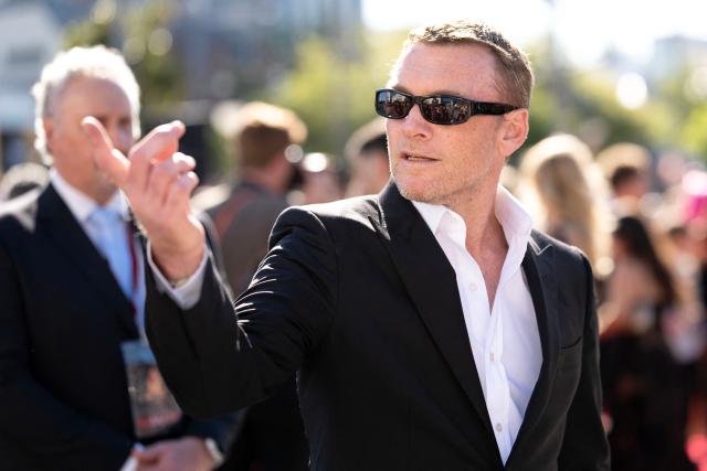 Australian actor Sam Worthington attends the Australasian premiere of "Avatar: Fire and Ash" in Wellington on December 13, 2025. (Photo by Marty MELVILLE / AFP)