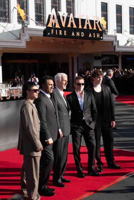 (L-R) Avatar cast Duane Evans Jr, Cliff Curtis, director James Cameron, Sam Worthington and Jack Champion attend the Australasian premiere of Avatar Fire and Ash in Wellington on December 13, 2025. (Photo by Marty MELVILLE / AFP)
