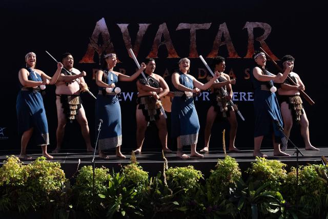 A Maori perfomance group welcomes guests to the red carpet during the Australasian premiere of Avatar Fire and Ash in Wellington on December 13, 2025. (Photo by Marty MELVILLE / AFP)