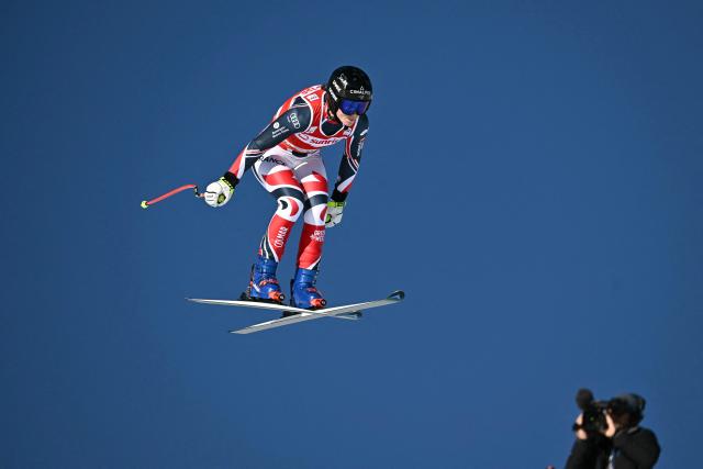 France's Romane Miradoli competes in the women's downhill race during the FIS Alpine Ski World Cup 2025-2026, in St Moritz, south-eastern Switzerland on December 13, 2025. (Photo by Fabrice COFFRINI / AFP)