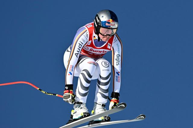 Germany's Emma Aicher competes in the women's downhill race during the FIS Alpine Ski World Cup 2025-2026, in St Moritz, south-eastern Switzerland on December 13, 2025. (Photo by Fabrice COFFRINI / AFP)