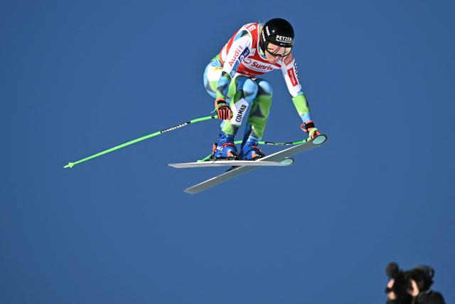 Slovenia's Ilka Stuhec competes in the women's downhill race during the FIS Alpine Ski World Cup 2025-2026, in St Moritz, south-eastern Switzerland on December 13, 2025. (Photo by Fabrice COFFRINI / AFP)