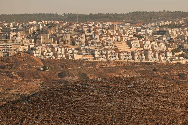 (FILES) This photograph shows the Israeli settlement of Beitar Illit, near the Palestinian town of Bethlehem in the occupied West Bank, on November 18, 2025. The expansion of Israeli settlements in the occupied West Bank is at its highest level since at least 2017, when the United Nations began tracking such data, according to a report by the UN chief seen by AFP on December 13, 2025. Excluding east Jerusalem, which was occupied and annexed by Israel in 1967, some 500,000 Israeli settlers live in the West Bank, along with about three million Palestinian residents. (Photo by AHMAD GHARABLI / AFP)