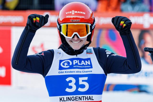 Germany's Selina Freitag reacts after competing in the Women's Individual Large Hill HS140 event of the FIS Ski Jumping World Cup in Klingenthal, eastern Germany on December 13, 2025. (Photo by JENS SCHLUETER / AFP)