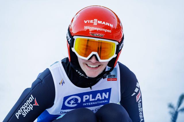 Germany's Selina Freitag reacts after competing in the Women's Individual Large Hill HS140 event of the FIS Ski Jumping World Cup in Klingenthal, eastern Germany on December 13, 2025. (Photo by JENS SCHLUETER / AFP)