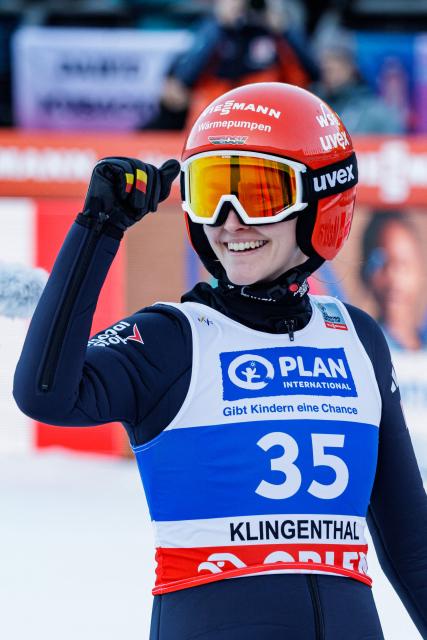 Germany's Selina Freitag reacts after competing in the Women's Individual Large Hill HS140 event of the FIS Ski Jumping World Cup in Klingenthal, eastern Germany on December 13, 2025. (Photo by JENS SCHLUETER / AFP)