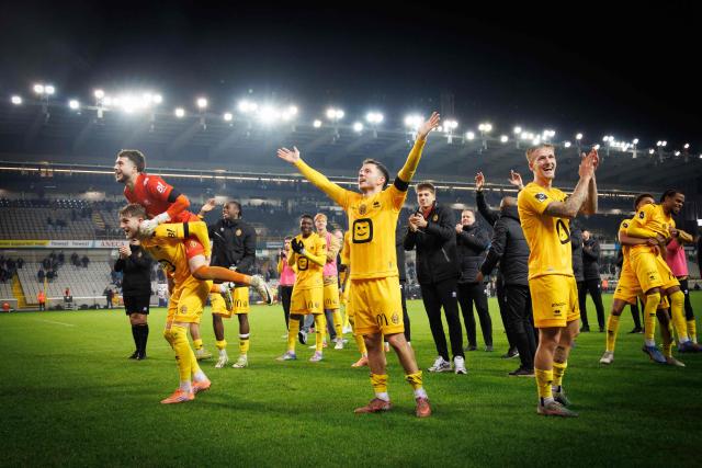 Mechelen's players celebrate after winning the Belgium Pro League football match between Cercle Bruges and KV Mechelen, at Jan Breydel Stadium in Bruges on December 13, 2025. (Photo by KURT DESPLENTER / Belga / AFP) / Belgium OUT