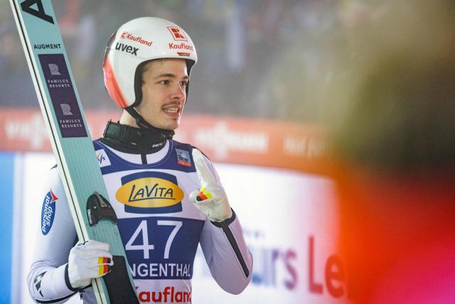 Germany's Raimund Philipp reacts after competing in the Men's Individual Large Hill HS140 event of the FIS Ski Jumping World Cup in Klingenthal, eastern Germany on December 13, 2025. Slovenia's Domen Prevc won the event ahead of Austria's Stefan Kraft (2nd) and Germany's Philipp Raimund (3rd). (Photo by JENS SCHLUETER / AFP)
