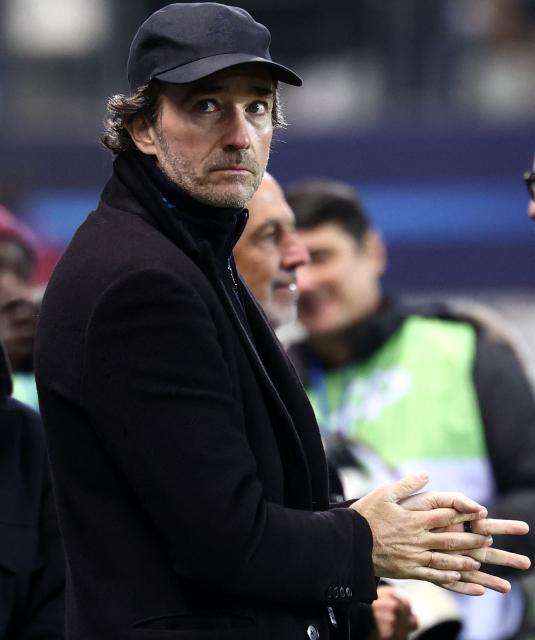 French representative of the Agache family holding company, Antoine Arnault (C) looks on ahead of the French L1 football match between Paris FC and Toulouse FC at the Stade Jean-Bouin in Paris on December 13, 2025. (Photo by FRANCK FIFE / AFP)