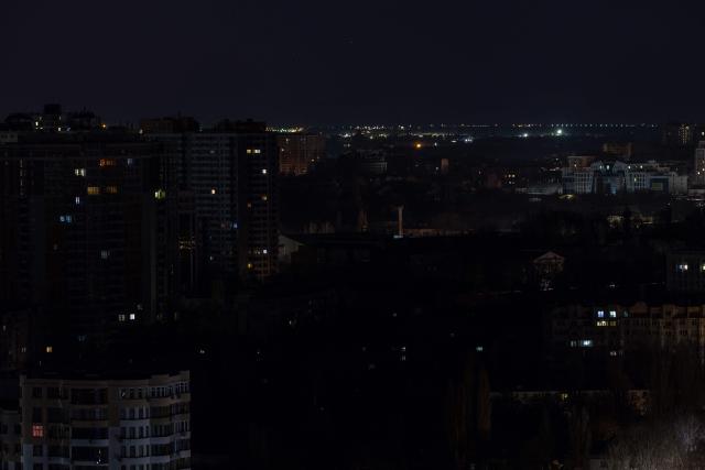 This photograph shows a general view of the southern city of Odesa, where some neighborhoods are without power on December 13, 2025, following missile and drone attacks on Ukrainian energy infrastructure, amid Russia’s invasion of Ukraine. (Photo by Oleksandr GIMANOV / AFP)