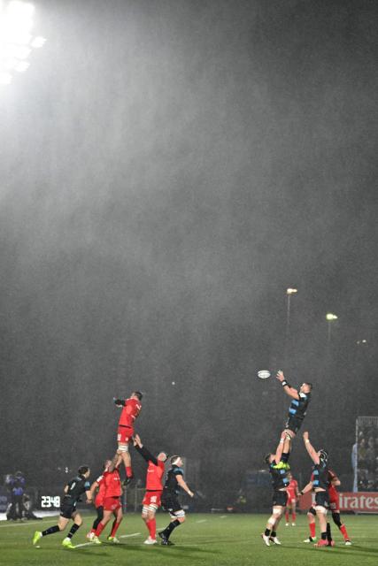 Glasgow Warriors' Scottish flanker Rory Darge wins line-out ball during the European Champions Cup rugby union pool 1 match between Glasgow Warriors and Toulouse at Scotstoun Stadium in Glasgow, Scotland on December 13, 2025. (Photo by ANDY BUCHANAN / AFP)