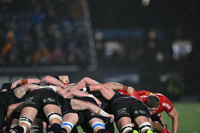 Players scrum down during the European Champions Cup rugby union pool 1 match between Glasgow Warriors and Toulouse at Scotstoun Stadium in Glasgow, Scotland on December 13, 2025. (Photo by ANDY BUCHANAN / AFP)