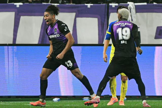 RSC Anderlecht's Canadian midfielder #13 Nathan-Dylan Saliba celebrates after scoring during the Belgian Pro League football match between RSC Anderlecht and Sint-Truidense V.V.  in Brussels on December 13, 2025. (Photo by JILL DELSAUX / Belga / AFP) / Belgium OUT