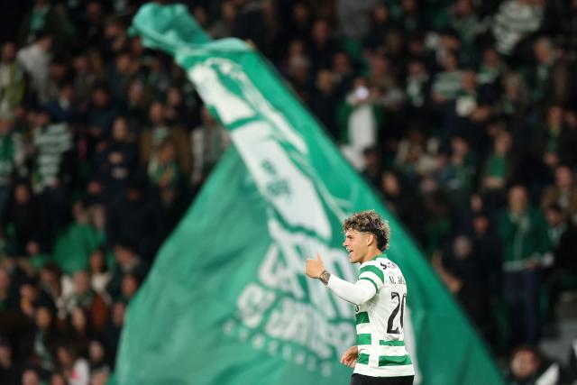 Sporting Lisbon's Uruguayan midfielder #20 Maximiliano Araujo celebrates scoring his team's fourth goal during the Portuguese League football match between Sporting CP and AVS Futebol SAD at Jose Alvalade stadium in Lisbon on December 13, 2025. (Photo by PATRICIA DE MELO MOREIRA / AFP)