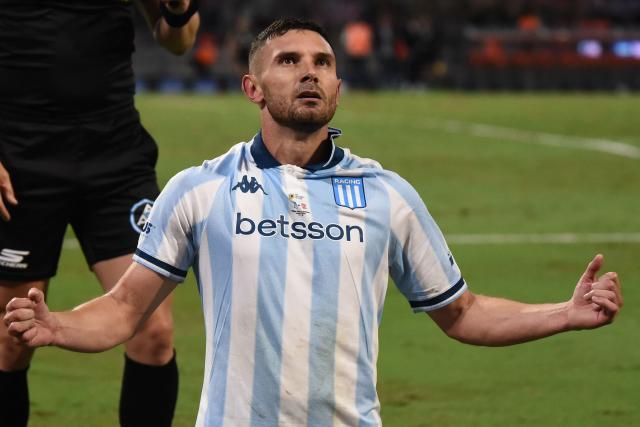 Racing's forward #09 Adrian Martinez celebrates scoring his team's first goal during the Argentine Professional Football League 2025 Clausura Tournament final match between Racing and Estudiantes at the Madre de Ciudades stadium in Santiago del Estero, Argentina on December 13, 2025. (Photo by Luis Santillan / AFP)