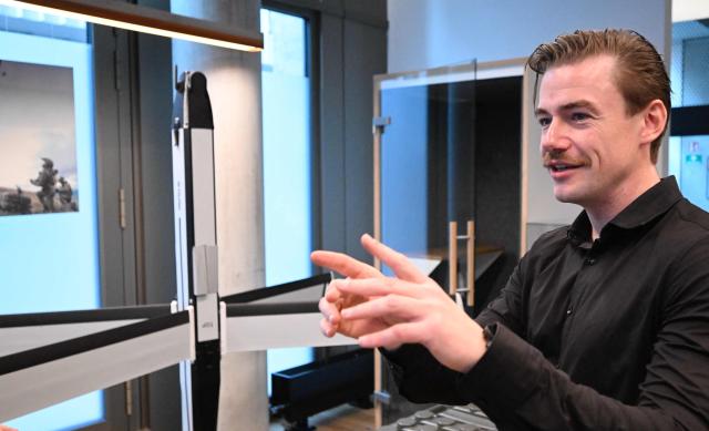 Senior Vice President at German tech defence start-up Stark Josef Kranawetvogl is pictured during an AFP interview on December 10, 2025 at the company’s show room in Berlin. Defence giants are drawing battle lines as Germany rearms, with the old guard arguing for a continued focus on traditional heavy weaponry while start-ups push for a shift to more modern kit like AI-enabled drones. (Photo by Tobias SCHWARZ / AFP) / TO GO WITH AFP STORY by Sam Reeves with Femke Colborne