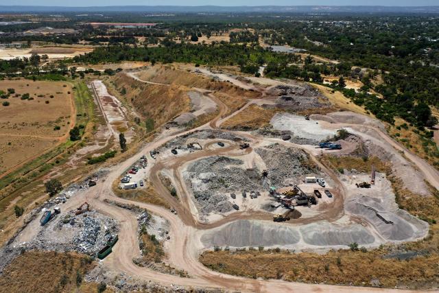 This photo taken on December 12, 2025 shows an aerial view of the Kwinana Town Rubbish Tip in the outskirts of Perth. Australia produces over 75 million tonnes of waste annually. (Photo by Antony DICKSON / AFP)