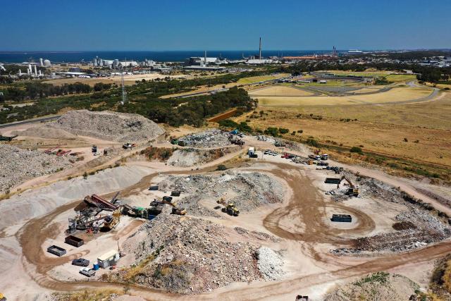 This photo taken on December 12, 2025 shows an aerial view of the Kwinana Town Rubbish Tip in the outskirts of Perth. Australia produces over 75 million tonnes of waste annually. (Photo by Antony DICKSON / AFP)
