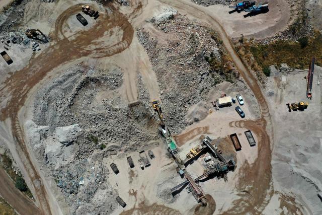 This photo taken on December 12, 2025 shows an aerial view of the Kwinana Town Rubbish Tip in the outskirts of Perth. Australia produces over 75 million tonnes of waste annually. (Photo by Antony DICKSON / AFP)