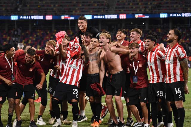 Estudiantes' celebrate after winning the penalty shootout of the Argentine Professional Football League 2025 Clausura Tournament final match between Racing and Estudiantes at the Madre de Ciudades stadium in Santiago del Estero, Argentina on December 13, 2025. (Photo by Luis Santillan / AFP)