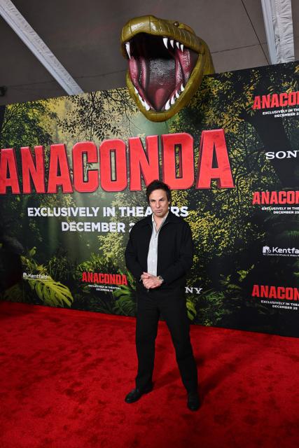 US director Tom Gormican attends the premiere of Columbia Pictures' "Anaconda" at The United Theater on Broadway in Los Angeles, California, on December 13, 2025. (Photo by Robyn Beck / AFP)