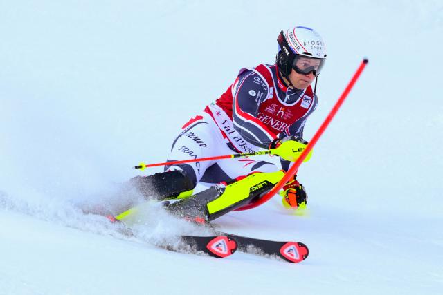 France's Steven Amiez competes during the first run of the Men's Slalom event of the FIS Alpine Skiing World Cup in Val d'Isere, on December 14, 2025. (Photo by Olivier CHASSIGNOLE / AFP)
