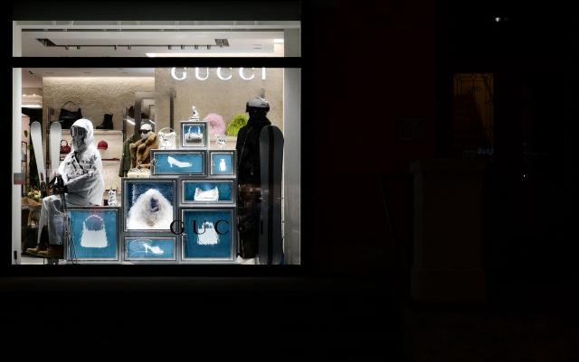 A picture shows a Gucci shop window in the main street of Cortina d'Ampezzo ahead the Milano Cortina 2026 Olympic Games, on December 10, 2025. (Photo by Stefano RELLANDINI / AFP)