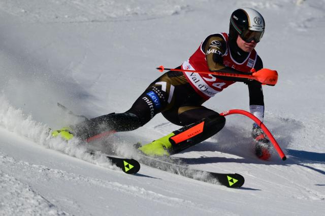 Finland's Eduard Hallberg competes during the first run of the Men's Slalom event of the FIS Alpine Skiing World Cup in Val d'Isere, on December 14, 2025. (Photo by Olivier CHASSIGNOLE / AFP)