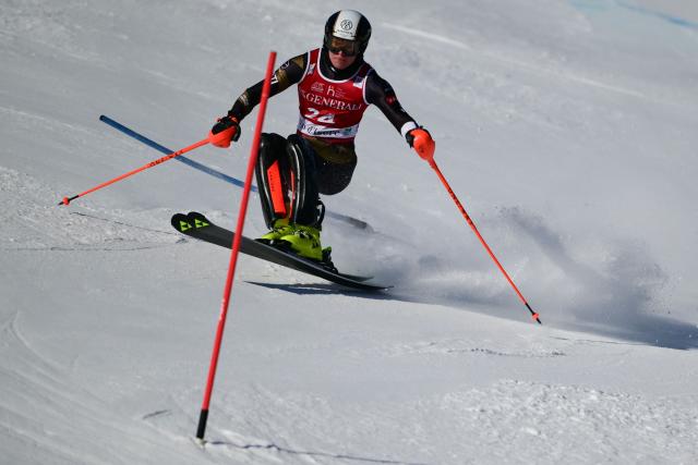 Finland's Eduard Hallberg competes during the first run of the Men's Slalom event of the FIS Alpine Skiing World Cup in Val d'Isere, on December 14, 2025. (Photo by Olivier CHASSIGNOLE / AFP)