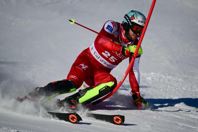 Austria's Michael Matt competes during the first run of the Men's Slalom event of the FIS Alpine Skiing World Cup in Val d'Isere, on December 14, 2025. (Photo by Olivier CHASSIGNOLE / AFP)