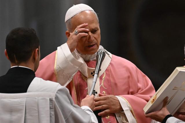 Pope Leo XIV leads a mass on the occasion of the Jubilee of Prisoners at St Peter's basilica in The Vatican on December 14, 2025. (Photo by Filippo MONTEFORTE / AFP)
