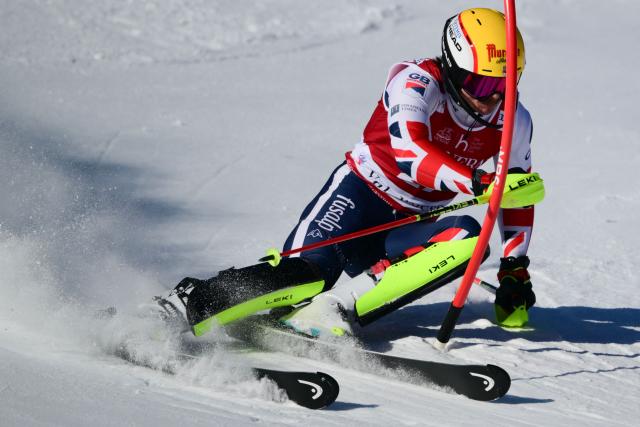 Great Britain's Laurie Taylor competes during the first run of the Men's Slalom event of the FIS Alpine Skiing World Cup in Val d'Isere, on December 14, 2025. (Photo by Olivier CHASSIGNOLE / AFP)
