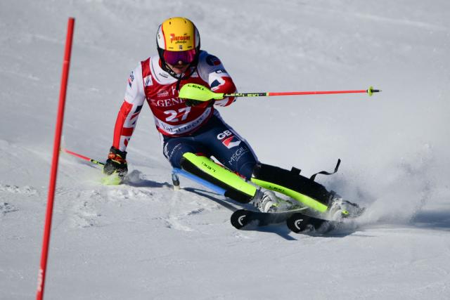 Great Britain's Laurie Taylor competes during the first run of the Men's Slalom event of the FIS Alpine Skiing World Cup in Val d'Isere, on December 14, 2025. (Photo by Olivier CHASSIGNOLE / AFP)