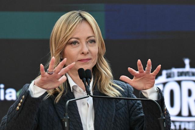 Italy's Prime Minister, Giorgia Meloni attends the Atreju political meeting organised by the young militants of Italian right wing party Brothers of Italy (Fratelli d'Italia) on December 14, 2025 in Rome. (Photo by Tiziana FABI / AFP)