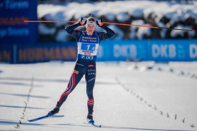 Norway's Vetle Sjastad Christiansen reacts as he crosses the finish line of the men's 4x7,5km relay event of the IBU Biathlon World Cup in Hochfilzen, Austria on December 14, 2025. (Photo by GEORG HOCHMUTH / APA / AFP) / Austria OUT