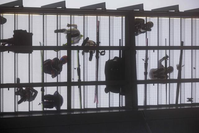 Participants prepare for the men's Individual Large Hill HS140 qualification of the FIS Ski Jumping World Cup in Klingenthal, eastern Germany on December 14, 2025 (Photo by JENS SCHLUETER / AFP)