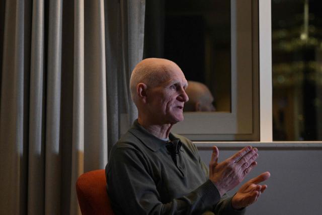 Nobel Peace Prize 2022 laureate Ales Bialiatski speaks to an AFP journalist during an interview in Vilnius on December 14, 2025, a day after his release from prison. Belarus has freed 123 prisoners, including protest leaders Viktar Babaryka, Maria Kolesnikova, and Nobel Peace Prize laureate Ales Bialiatski, on December 13, 2025, after the US envoy earlier said Washington was lifting sanctions on Belarusian potassium. (Photo by Sergei GAPON / AFP)