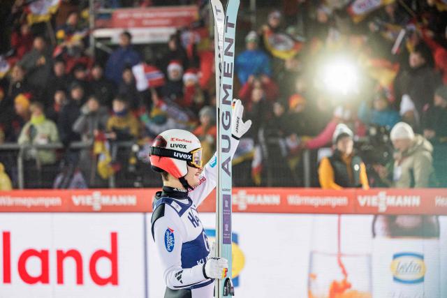 Germany's Philipp Raimund reacts after competing in the men's Individual Large Hill HS140 of the FIS Ski Jumping World Cup in Klingenthal, eastern Germany on December 14, 2025 (Photo by JENS SCHLUETER / AFP)