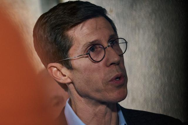 Providence Mayor Brent Smileys speak during a press conference near the campus of Brown University in Providence, Rhode Island on December 14, 2025. Hundreds of police officers hunted Sunday for a gunman who killed two people and wounded nine others at Brown University, plunging the eastern US campus into lockdown. (Photo by Bing Guan / AFP)