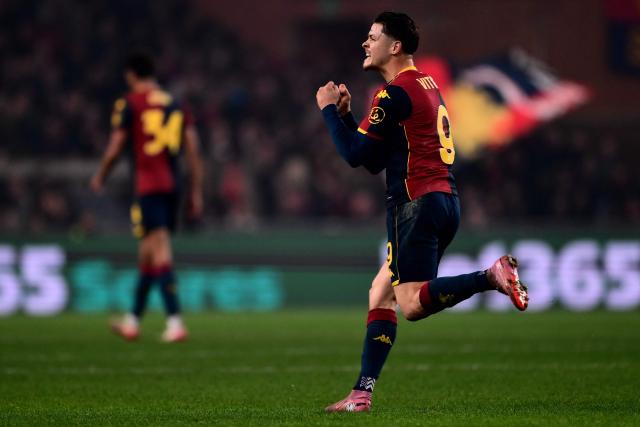 Genoa’s Portuguese forward #9 Vitinha celebrates after scoring a goal during the Italian Serie A football match between Genoa and Inter Milan at Luigi Ferraris Stadium in Genoa on December 14, 2025. (Photo by MARCO BERTORELLO / AFP)