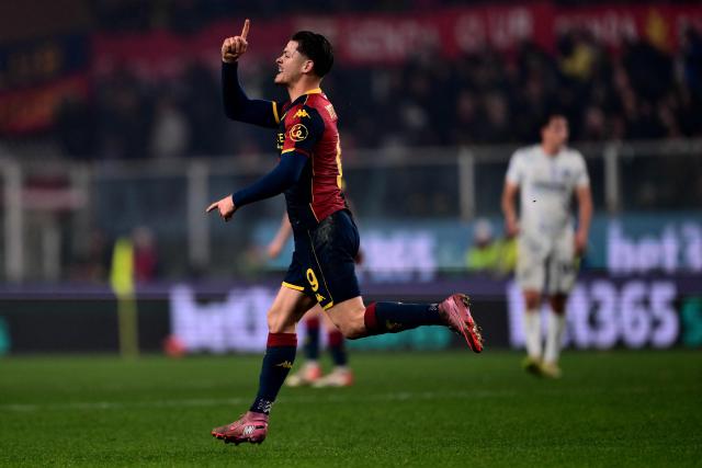 Genoa’s Portuguese forward #9 Vitinha celebrates after scoring a goal during the Italian Serie A football match between Genoa and Inter Milan at Luigi Ferraris Stadium in Genoa on December 14, 2025. (Photo by MARCO BERTORELLO / AFP)