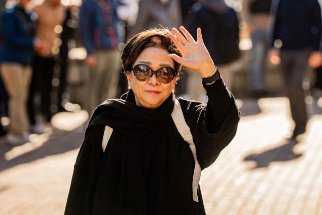 Emily Lau, former chairperson of the now-dissolved Democratic Party of Hong Kong, enters the West Kowloon Law Courts ahead of the expected verdicts in the national security trial of pro-democracy media tycoon Jimmy Lai in Hong Kong on December 15, 2025. Long-awaited verdicts in Hong Kong pro-democracy media tycoon Jimmy Lai's national security trial will be delivered on December 15, one of the city's most closely watched rulings since its return to Chinese rule in 1997. (Photo by Leung Man Hei / AFP)