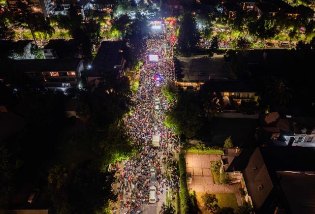Aerial view of supporters of Chile's presidential candidate Jose Antonio Kast, of the Partido Republicano party, as he delivers a speech after the results of the presidential runoff election in Santiago on December 14, 2025. Chilean voters elected Jose Antonio Kast, the most right-wing president in 35 years of democracy, with a thumping 58 percent of votes and his rival Jeannette Jara conceding defeat, according to official results on December 14, 2025. (Photo by Eitan ABRAMOVICH / AFP)