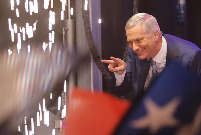 Chile's presidential candidate Jose Antonio Kast, of the Partido Republicano party, gestures to supporters as he celebrates the results of the presidential runoff election in Santiago on December 14, 2025. Chilean voters elected Jose Antonio Kast, the most right-wing president in 35 years of democracy, with a thumping 58 percent of votes and his rival Jeannette Jara conceding defeat, according to official results on December 14, 2025. (Photo by Javier TORRES / AFP)