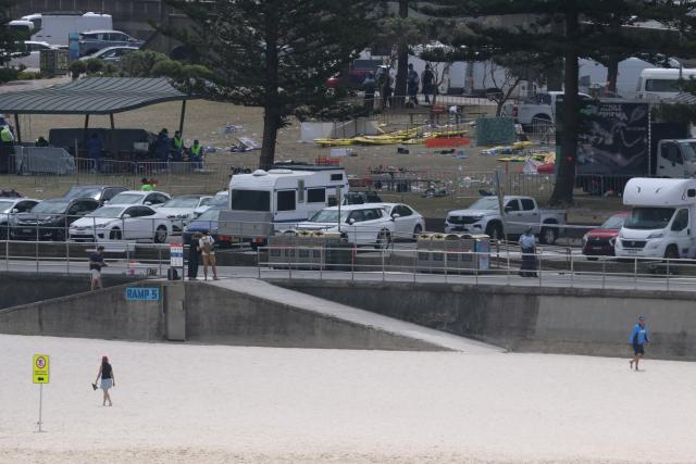 A view of the scene at the Bondi Pavillion in the aftermath of the Bondi Beach shootings in Sydney on December 15, 2025. A father-and-son team toting long-barrelled guns shot and killed 15 people including a 10-year-old girl at Sydney's Bondi Beach on December 14, with authorities labelling it an antisemitic terrorist attack on a Jewish festival. (Photo by DAVID GRAY / AFP)